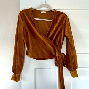 Vestique wrapped top- Perfect for fall/ winter!